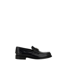Triangular plaque Loafers Prada