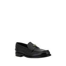 Triangular plaque Loafers Prada