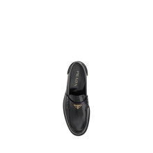 Triangular plaque Loafers Prada